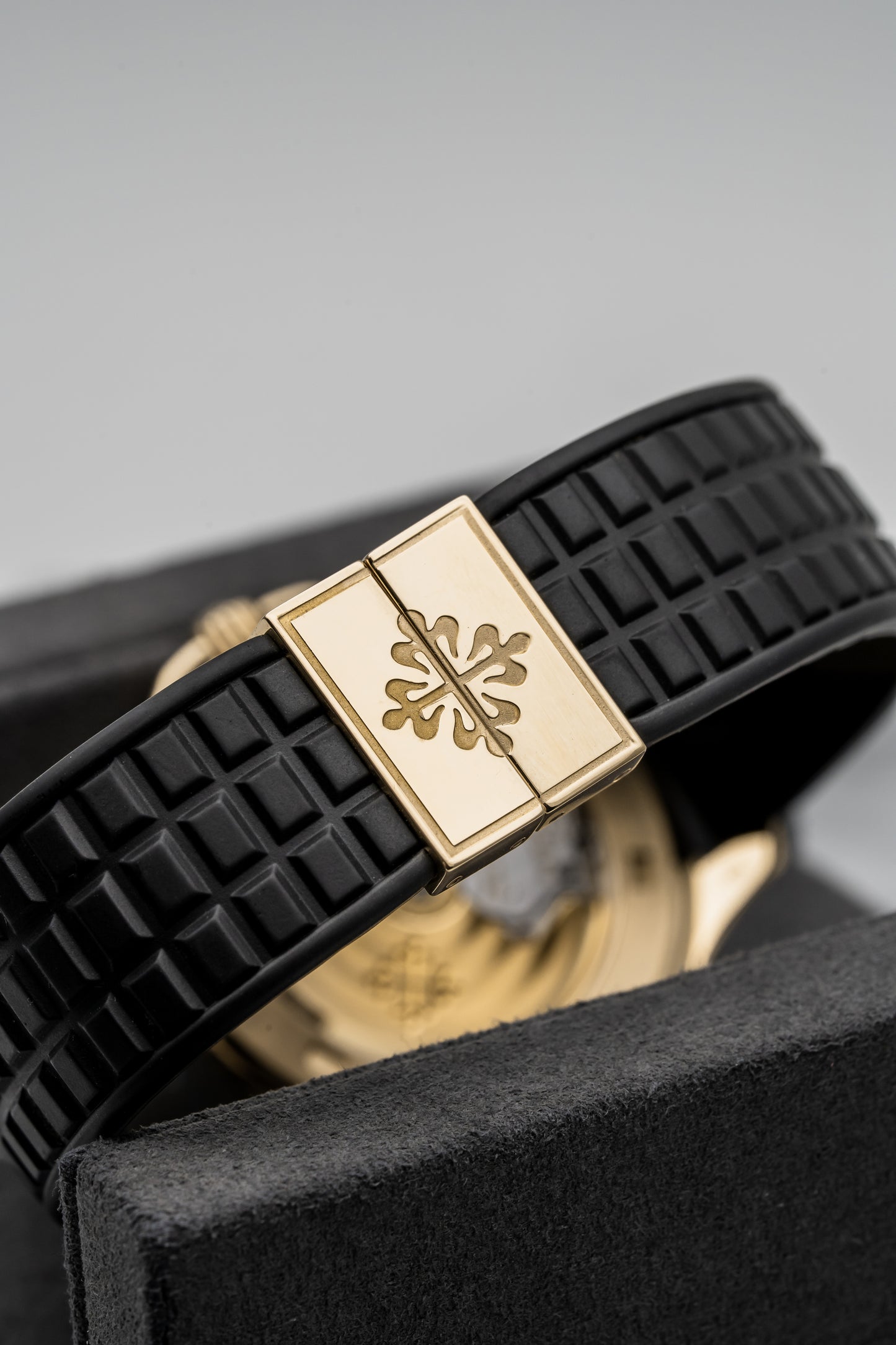 Patek Philippe Aquanaut 5065J-001 – 18K Yellow Gold, Black Embossed Dial